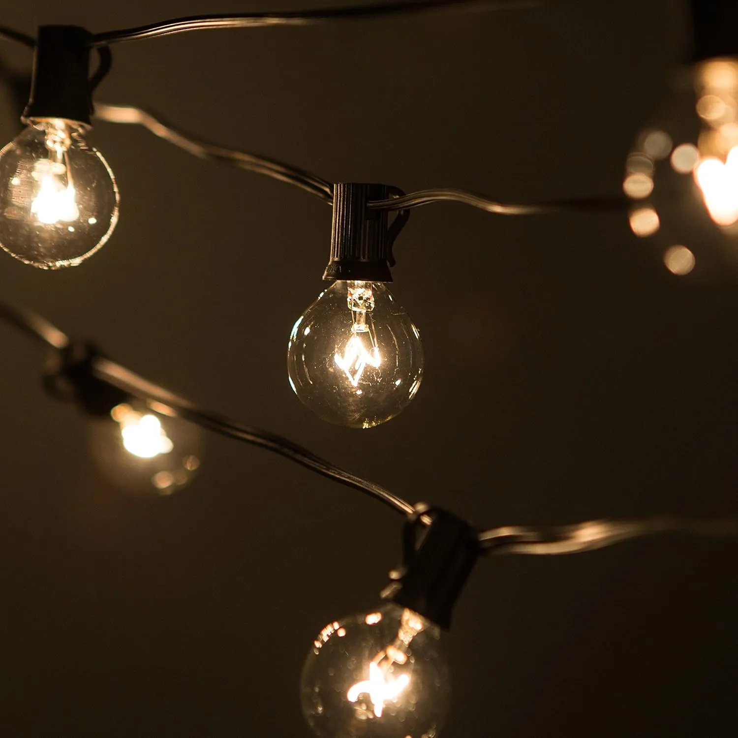 Hometown Evolution, Inc. 25’ G40 Bulb String Lights with Clear Bulbs and Black Wire (  1 Free Spare) for Balcony, Canopy, Pergola, Deck, Bedroom, and Patio Lighting!