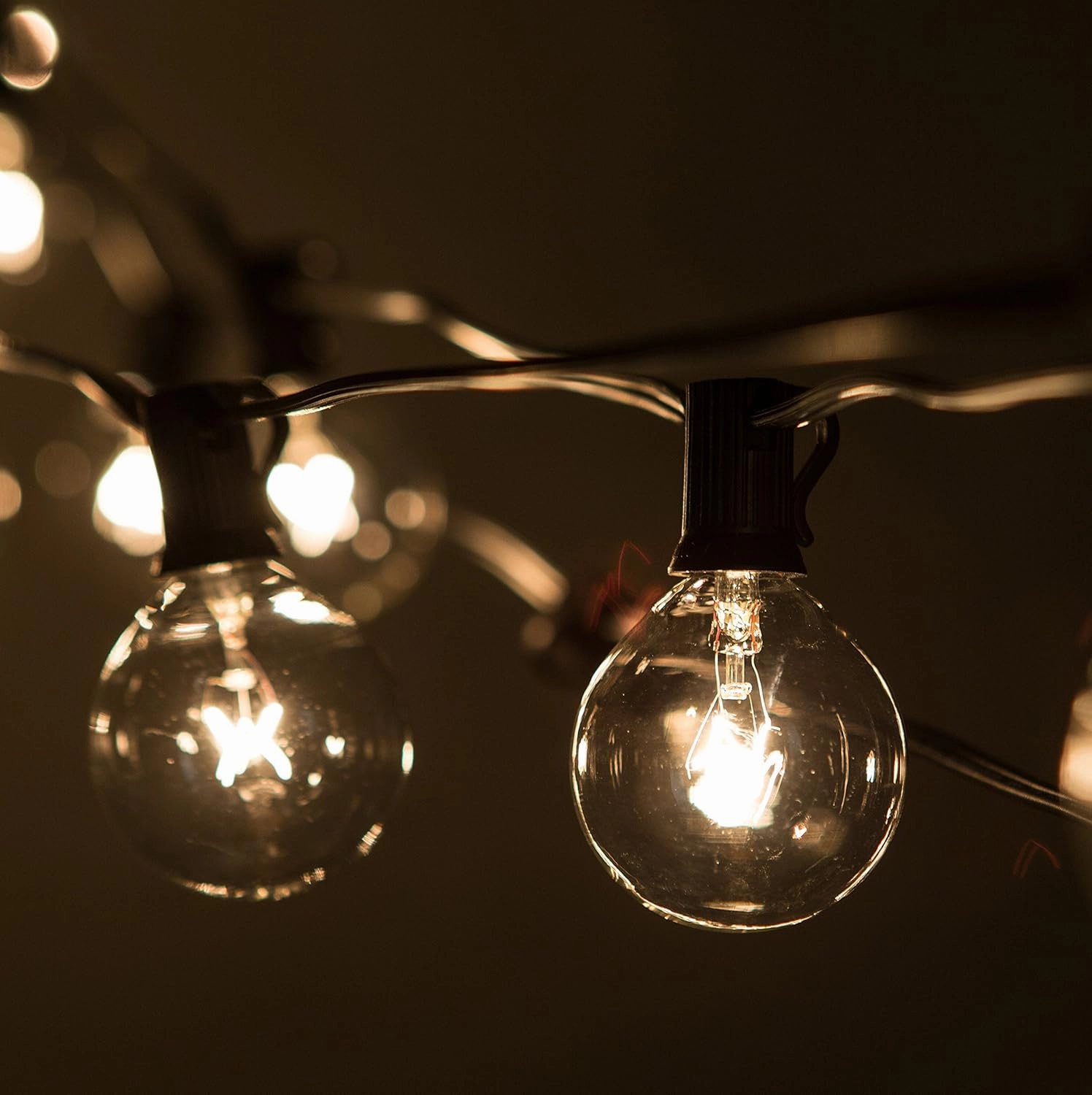 Hometown Evolution, Inc. 25’ Globe Patio String Lights with G50 2” Clear Light Bulbs and Black Wire ( 1 Free Spare)